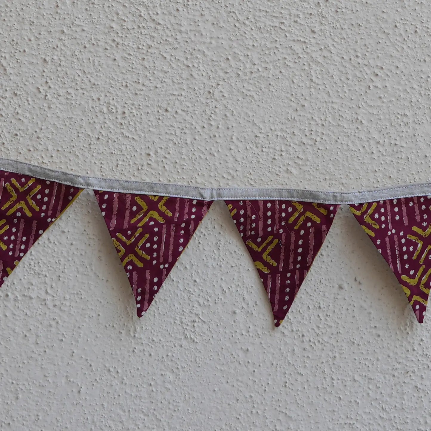 Upcycled Fabric Pennant – Pataka Dark Marron with Print Design