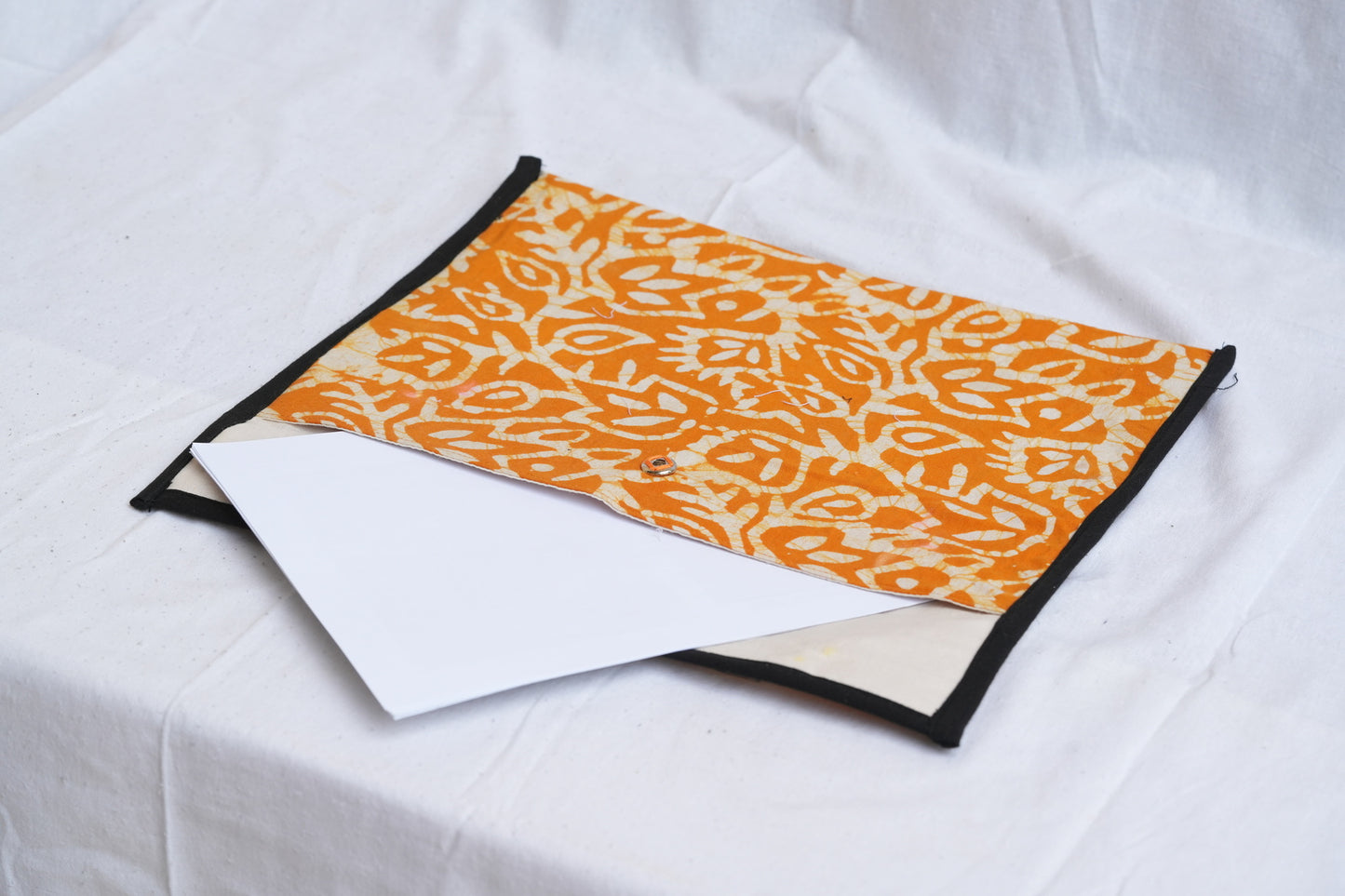 Upcycled Fabric Folder - Laptop Cover Vibrant floral pattern on a cream linen base